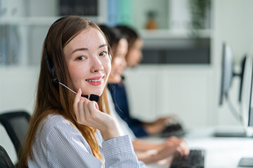 Portrait of Caucasian young business woman call center work in office. 