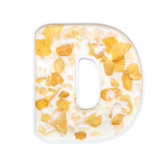 cornflakes cereal with milk in alphabet plate