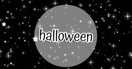 Fototapeta premium Composition of halloween text over stars on black background
