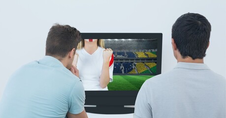 Composition of two male sports fans watching football match on tv