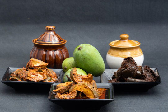 Mango Pickle Also Called Aam Ka Achar, Organic Dry Kachi Keri Achaar, Masaledar Sookha Kairi Made Of Kacha Raw Green Sliced Mangoes Mixed Marinated With Ghani Sarson Tel, Masala, Spices, Mustard Oil