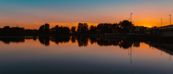Beautiful sunset with reflections near Plattling, Isar, Bavaria, Germany