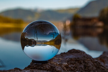 Crystal ball alpine landscape shot at the famous Pillersee lake at Saint Ulrich, Tyrol, Austria