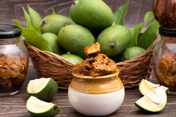 Mango Pickle Also Called Aam Ka Achar, Sookha Kairi, Chatpata Loncha Is Made of Unpeeled Raw Green Mango Cut Mixed With Spices - Garlic, Masala, Red Chilli, Salt, Turmeric, Sarson, Mustard, Sarso Oil