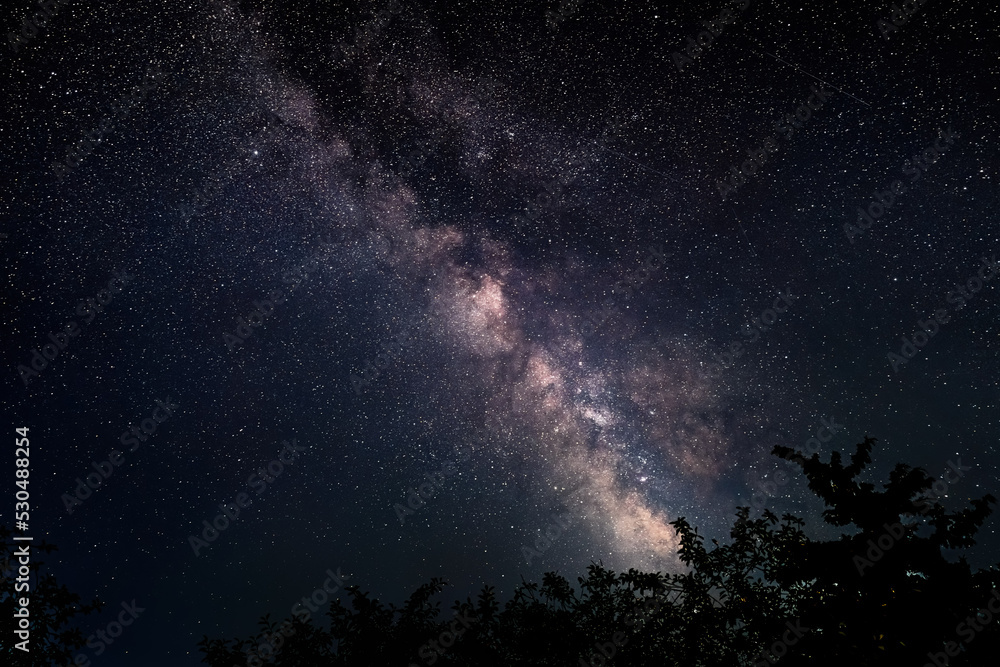 Wall mural milky way galaxy in dark night sky