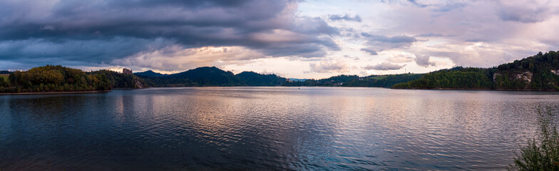 Evening panorama of the Czorsztyn Lake. Beautiful colors of the sky. Czorsztyn, Poland