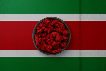 Wooden basket on background in colors of national flag. Photography and marketing digital backdrop....