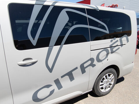 citroën logo sign and brand text on side panel van space tourer dealership vehicle