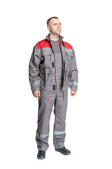 Naklejka premium man in special clothes for workers on a white isolated background. a man in uniform