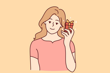 Smiling young woman with present in hands excited with birthday celebration. Happy girl with gift box having anniversary. Vector illustration. 