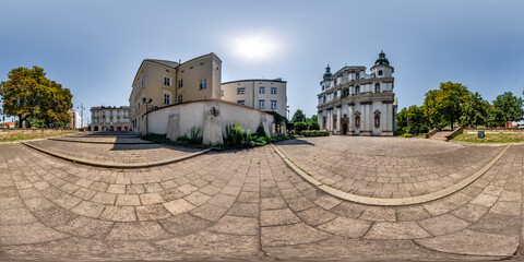 full 360 hdri panorama in narrow streets near church and historical buildings with a lot of...