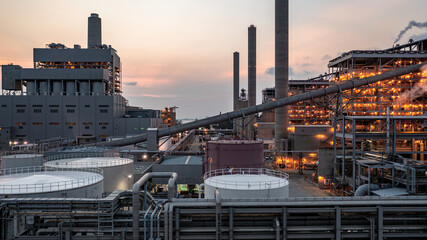 Aerial view coal power plant at dusk, Coal power station chimney pipes production electricity, Coal power plant in electricity generation.