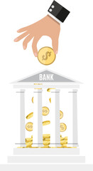 Hand putting golden coin into bank building.