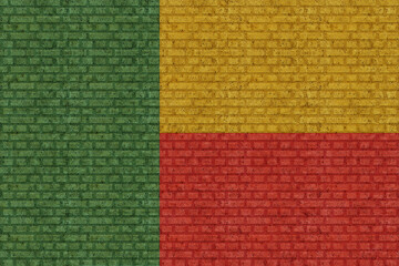 3D Flag of Benin on an old brick wall background.