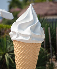 Large artificial ice cream in the park.