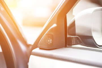 Car interior. Front handle door panel. Car open door window buttons.