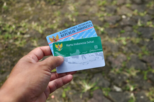Holds a Healthy Indonesia Card (Health Insurance card from the Government of Indonesia) and Indonesian identity card