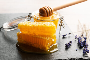 Honeycomb on slate tray on kitchen table closeup