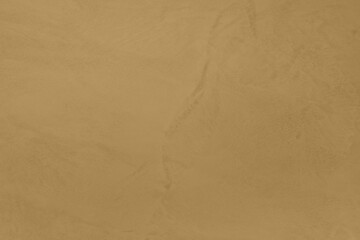 Saturated pastel greenish beige colored low contrast Concrete textured background. Empty colourful wall texture with copy space for text overlay and mockups. 2023, 2024 color trend