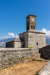 Clock Tower in Gjirokaster Citadel surrounded by ancient ruins, attraction in Albania, Europe - 530514861