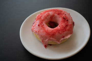 donut with strawberry jam