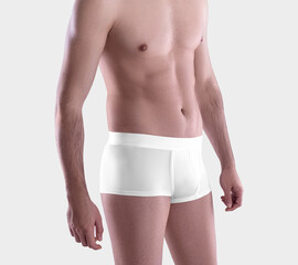 Mockup of white male trunks on a guy, brief underpants close-up, for design, pattern, advertising,...