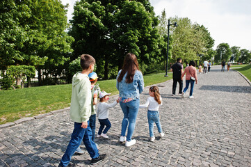 Obraz na płótnie Canvas Mother with kids walking at near Bratislava castle , Slovakia.
