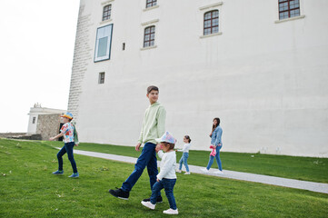 Mother with kids walking at near Bratislava castle , Slovakia.