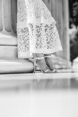 Black and white photo of bride on shoes 