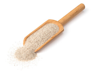 Raw rye flour in the wooden scoop, isolated on white background.