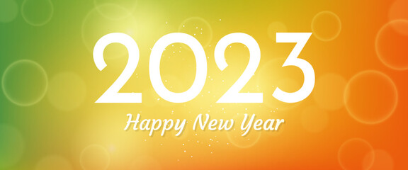 Happy new year 2023 incription on blurred background