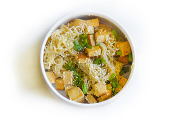 A homemade vegan pasta with greens and tofu. Good for any project.