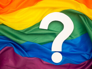 Question mark over the rainbow flag or LGBT flag background