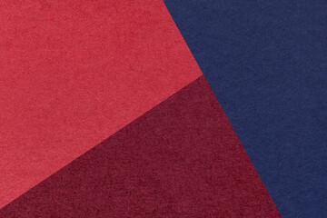 Fototapeta premium Texture of craft navy blue, wine and red shade color paper background, macro. Vintage abstract cardboard