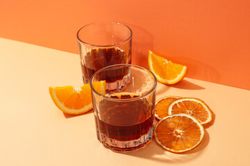 Concept of delicious alcohol drink, Whiskey with orange