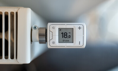 Close-up of smart heating thermostat - obrazy, fototapety, plakaty