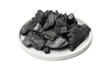 Natural wood charcoal isolated on white background