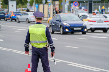 Traffic officer standing near road