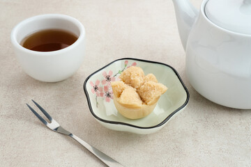 Kue Mangkok (Chinese fa gao) known as fortune cake, usually for Chinese New Year. Made from wheat flour and rice flour. Served on plate
