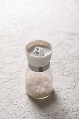 salt jar on white background