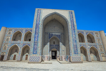 Fototapeta na wymiar View to the Main Entrance to the Ulug'bek madrasasi near the Ghijduwon Shahri in Bukhara, Uzbekistan