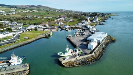 Bird's eye view of Greencastle Harbor with moored boats. Donegal, Ireland.