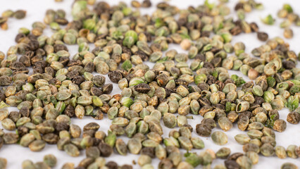 cannabis seeds closeup, hemp grain macro.