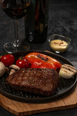 grilled pork steak with vegetables and spices