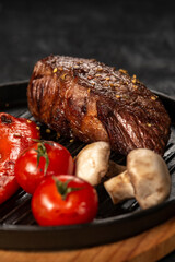 grilled pork steak with vegetables and spices