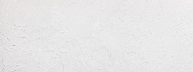 Fototapeten Konkrete Mediterrane, unebene Kalkputz-Wandoberfläche aus Kalkstein - handgefertigte Textur aus weißer Betonwand - Hintergrund, Panorama  © Floydine