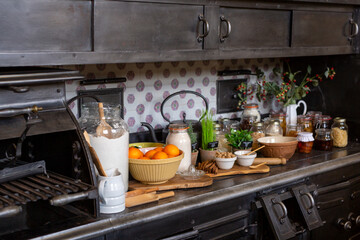 Black vintage kitchen with various products on it