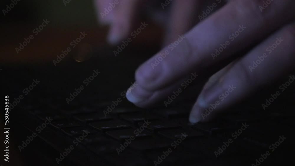 Aufkleber closeup shot of hands of the hacker typing on the keyboard fast