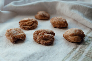 Bakery products. Homemade cookies with sugar on a towel background. Background image, copy space.