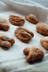 Bakery products. Homemade cookies with sugar on a towel background. Background image, copy space.